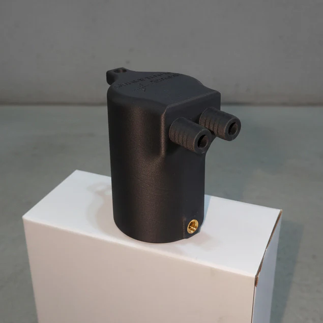 High-flow additively manufactured catch can rendering